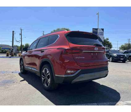 2019UsedHyundaiUsedSanta FeUsed2.0T Auto FWD is a Orange 2019 Hyundai Santa Fe Car for Sale in San Antonio TX