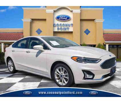 2019 Ford Fusion Energi Titanium is a Silver, White 2019 Ford Fusion Energi Titanium Car for Sale in Estero FL