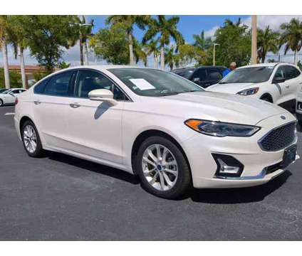 2019 Ford Fusion Energi Titanium is a Silver, White 2019 Ford Fusion Energi Titanium Car for Sale in Estero FL