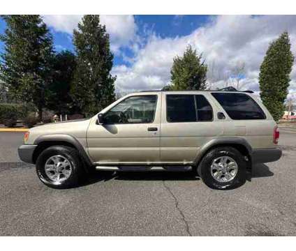 2000 Nissan Pathfinder LE is a Silver 2000 Nissan Pathfinder LE SUV in Woodinville WA