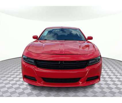 2021 Dodge Charger SXT is a Red 2021 Dodge Charger SXT Sedan in Lake City FL