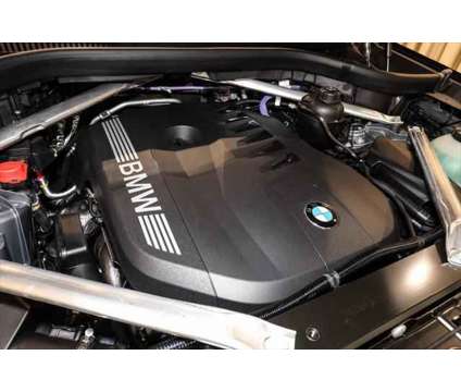 2024 BMW X5 xDrive40i is a Grey 2024 BMW X5 3.0si SUV in Akron OH