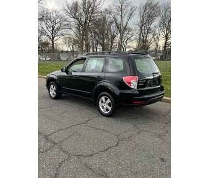 2011 Subaru Forester for sale is a Black 2011 Subaru Forester 2.5i Car for Sale in Avenel NJ