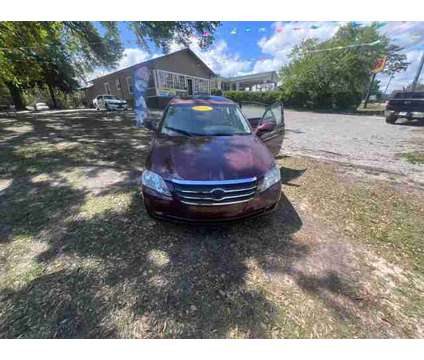 2006 Toyota Avalon for sale is a Red 2006 Toyota Avalon Car for Sale in Mobile AL