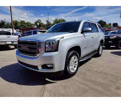 2018 GMC Yukon for sale is a Silver 2018 GMC Yukon 1500 4dr Car for Sale in Englewood CO