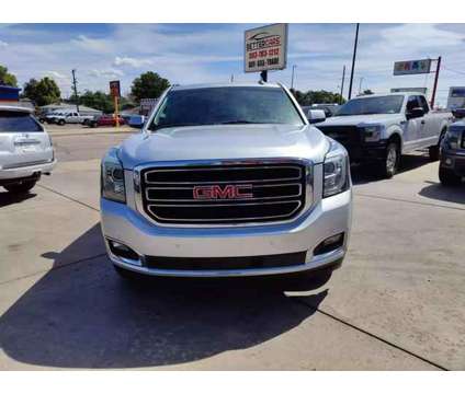 2018 GMC Yukon for sale is a Silver 2018 GMC Yukon 1500 4dr Car for Sale in Englewood CO
