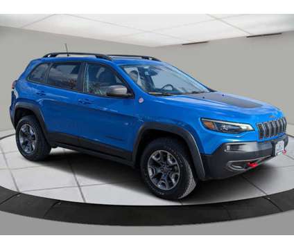 2020 Jeep Cherokee Trailhawk is a Blue 2020 Jeep Cherokee Trailhawk Car for Sale in Greeley CO