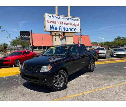 2014 Nissan Frontier Crew Cab for sale is a Black 2014 Nissan frontier Car for Sale in Orlando FL
