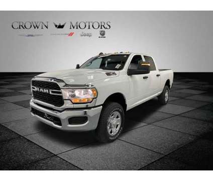 2024 Ram 2500 Tradesman is a White 2024 RAM 2500 Model Tradesman Truck in Holland MI