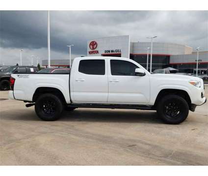 2023 Toyota Tacoma SR V6 is a Silver 2023 Toyota Tacoma SR Truck in Katy TX