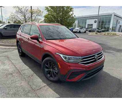 2024 Volkswagen Tiguan 2.0T SE is a Red 2024 Volkswagen Tiguan 2.0T S SUV in Lees Summit MO