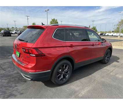 2024 Volkswagen Tiguan 2.0T SE is a Red 2024 Volkswagen Tiguan 2.0T S SUV in Lees Summit MO