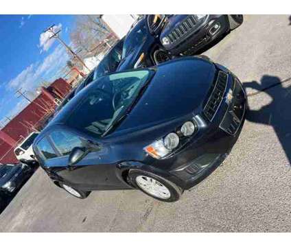2015 Chevrolet Sonic for sale is a Black 2015 Chevrolet Sonic Car for Sale in Englewood CO