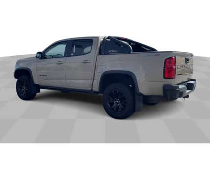 2021UsedChevroletUsedColoradoUsedCrew Cab 128 is a Tan 2021 Chevrolet Colorado Car for Sale in Milwaukee WI