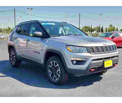 2020UsedJeepUsedCompassUsed4x4 is a Silver 2020 Jeep Compass Car for Sale in Houston TX