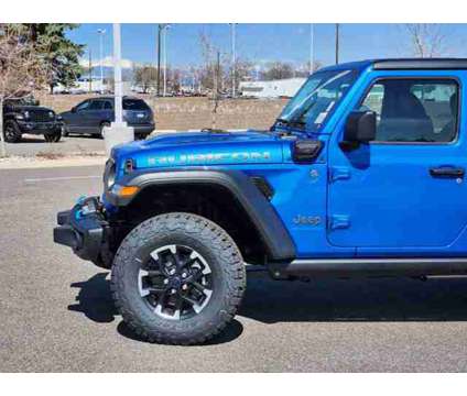 2024 Jeep Wrangler 4xe Rubicon is a Blue 2024 Jeep Wrangler Car for Sale in Denver CO