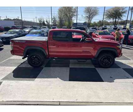 2023 Toyota Tacoma 4WD TRD Off Road is a Red 2023 Toyota Tacoma Car for Sale in Wilmington NC