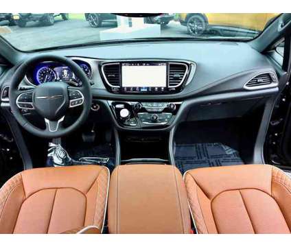 2024 Chrysler Pacifica Pinnacle AWD is a Black 2024 Chrysler Pacifica Car for Sale in Rockford IL