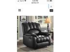 Plush faux leather recliner