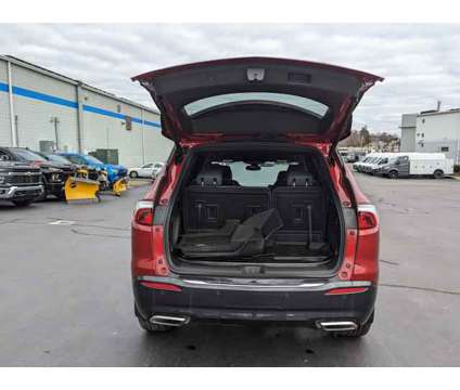 2023 Buick Enclave Essence AWD is a Red 2023 Buick Enclave Essence Car for Sale in New London CT