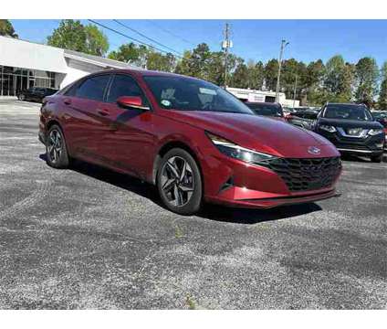 2023 Hyundai Elantra SEL is a Red 2023 Hyundai Elantra Sedan in Auburn AL