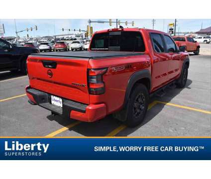 2023 Nissan Frontier Crew Cab PRO-4X 4x4 is a Red 2023 Nissan frontier Truck in Rapid City SD