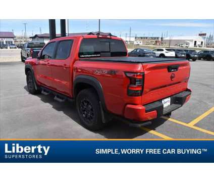 2023 Nissan Frontier Crew Cab PRO-4X 4x4 is a Red 2023 Nissan frontier Truck in Rapid City SD