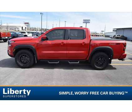 2023 Nissan Frontier Crew Cab PRO-4X 4x4 is a Red 2023 Nissan frontier Truck in Rapid City SD