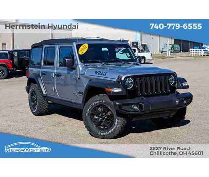 2021 Jeep Wrangler Unlimited Willys 4x4 is a Silver 2021 Jeep Wrangler Unlimited SUV in Chillicothe OH