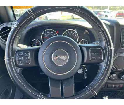 2018 Jeep Wrangler JK Willy Wheeler 4x4 is a Silver 2018 Jeep Wrangler SUV in New Bern NC