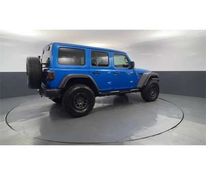 2022 Jeep Wrangler Unlimited Willys is a Blue 2022 Jeep Wrangler Unlimited SUV in Daphne AL