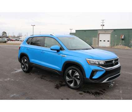 2024 Volkswagen Taos 1.5T SE is a Blue 2024 1.5T SE SUV in Bay City MI