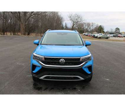 2024 Volkswagen Taos 1.5T SE is a Blue 2024 1.5T SE SUV in Bay City MI