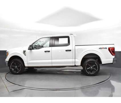 2021 Ford F-150 XLT is a White 2021 Ford F-150 XLT Truck in Jackson MS