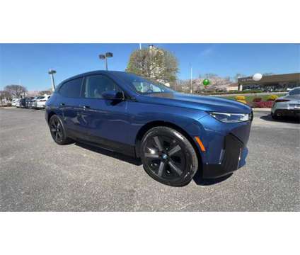 2024 BMW iX xDrive50 is a Blue 2024 BMW 325 Model iX SUV in Newport News VA