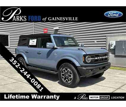 2024 Ford Bronco Outer Banks is a Blue, Grey 2024 Ford Bronco SUV in Gainesville FL