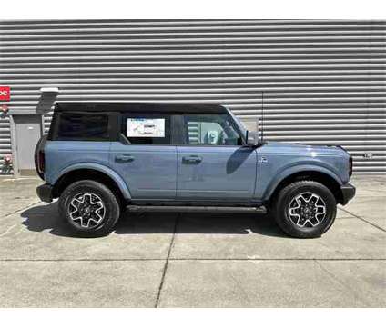 2024 Ford Bronco Outer Banks is a Blue, Grey 2024 Ford Bronco SUV in Gainesville FL