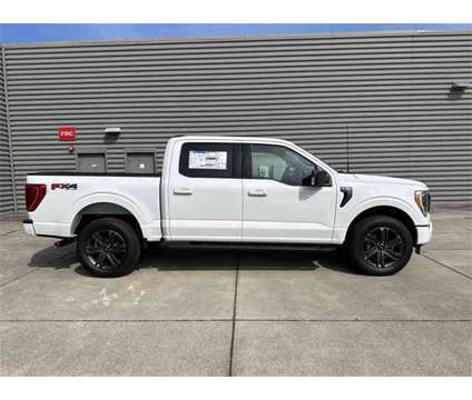 2023 Ford F-150 XLT is a White 2023 Ford F-150 XLT Truck in Gainesville FL