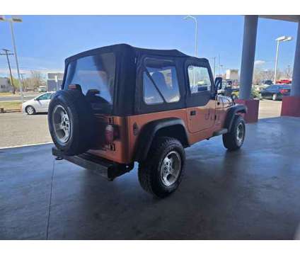 2001 Jeep Wrangler for sale is a Orange 2001 Jeep Wrangler Car for Sale in Las Cruces NM