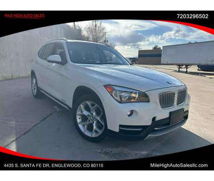 2014 BMW X1 for sale is a White 2014 BMW X1 Car for Sale in Englewood CO