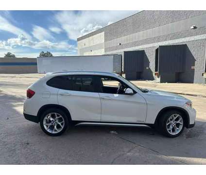 2014 BMW X1 for sale is a White 2014 BMW X1 Car for Sale in Englewood CO