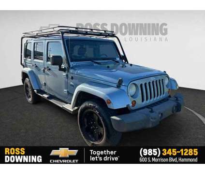 2012 Jeep Wrangler Unlimited Arctic 4X4 is a White 2012 Jeep Wrangler Unlimited Car for Sale in Hammond LA