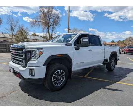 2023 GMC Sierra 2500HD AT4 is a White 2023 GMC Sierra 2500 H/D Car for Sale in Aurora CO