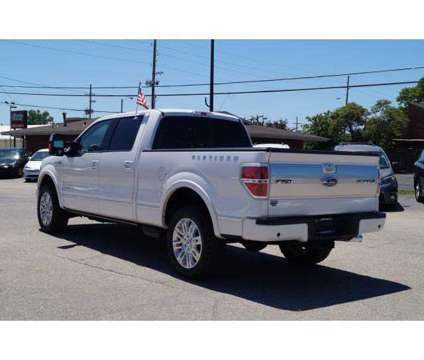 2013 Ford F-150 Platinum is a White 2013 Ford F-150 Platinum Car for Sale in Hutchinson KS