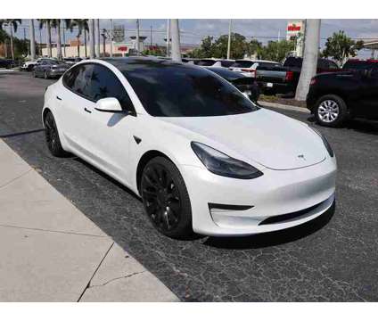 2022 Tesla Model 3 Performance is a White 2022 Tesla Model 3 Sedan in Fort Myers FL