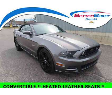 2014 Ford Mustang GT CONVERTIBLE is a Grey 2014 Ford Mustang GT Convertible in Cadillac MI