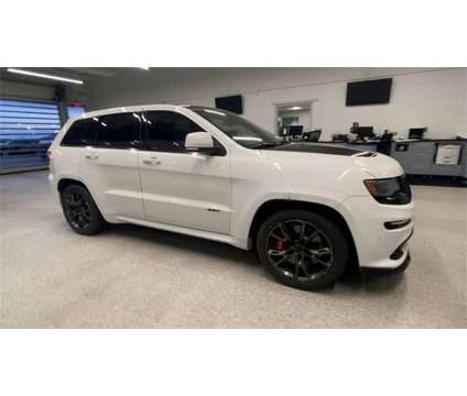 2014 Jeep Grand Cherokee SRT is a White 2014 Jeep grand cherokee SRT SUV in Colorado Springs CO