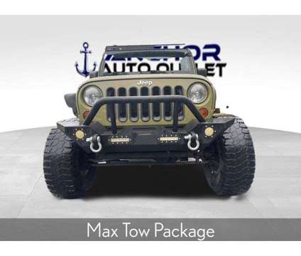 2013 Jeep Wrangler Unlimited Sport is a Green 2013 Jeep Wrangler Unlimited SUV in Cary NC