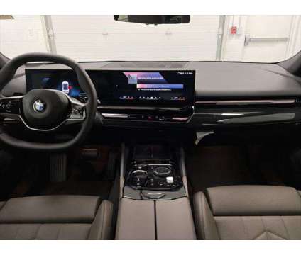 2024 BMW 5 Series i xDrive is a White 2024 BMW 5-Series Sedan in Erie PA