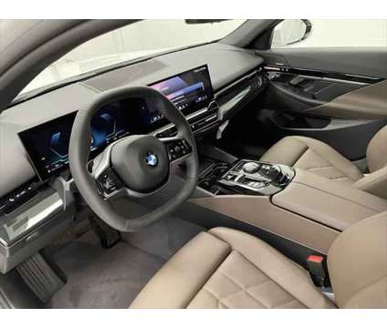 2024 BMW 5 Series i xDrive is a White 2024 BMW 5-Series Sedan in Erie PA